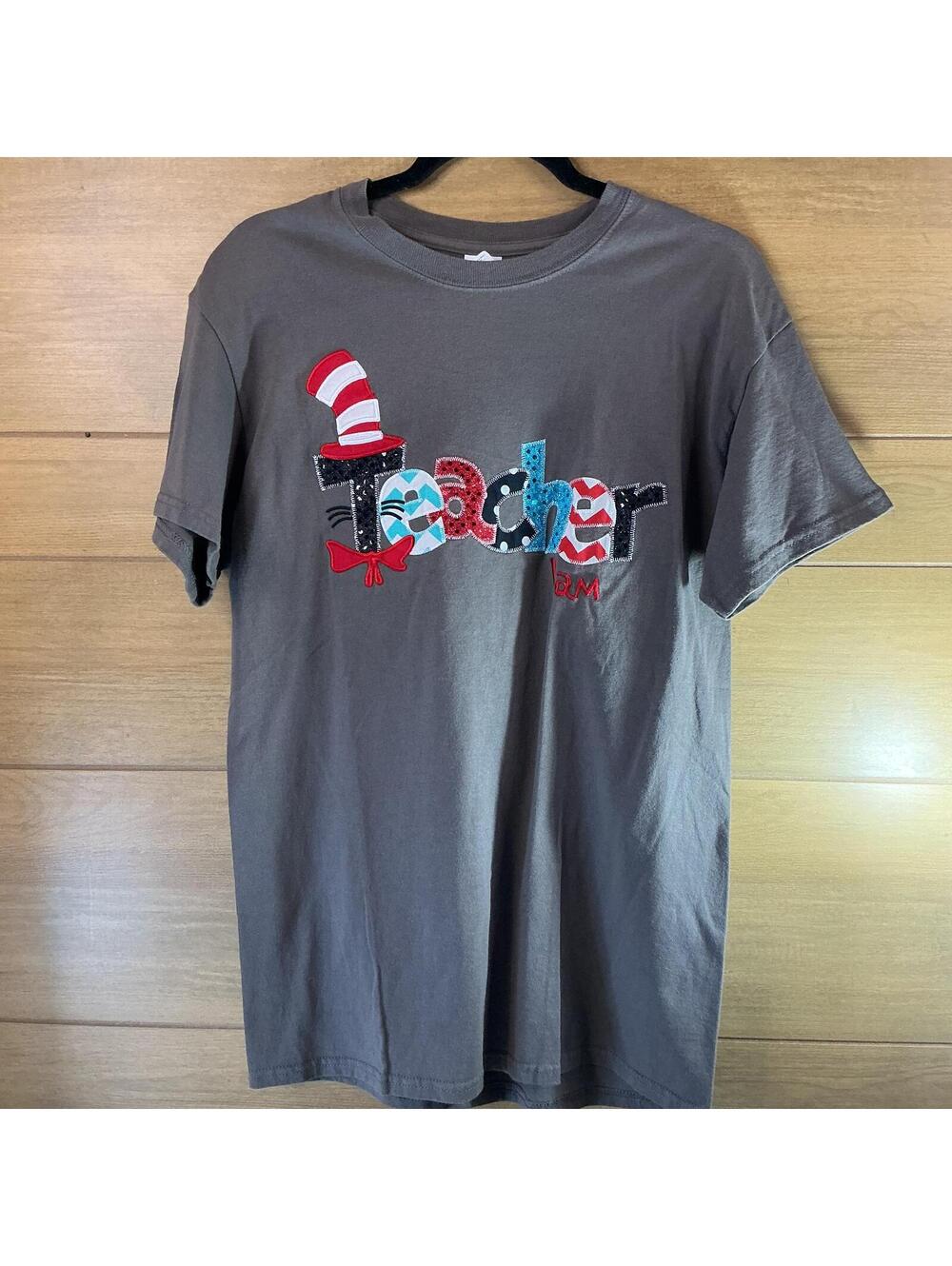 Dr. Seuss Teacher Team Applique Graphic T-Shirt Gray Unisex Medium Cotton